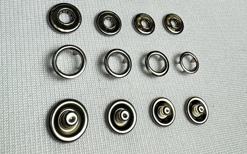 Broches doble corona metalizados